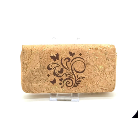 Cork clutch with butterfly design on a white background