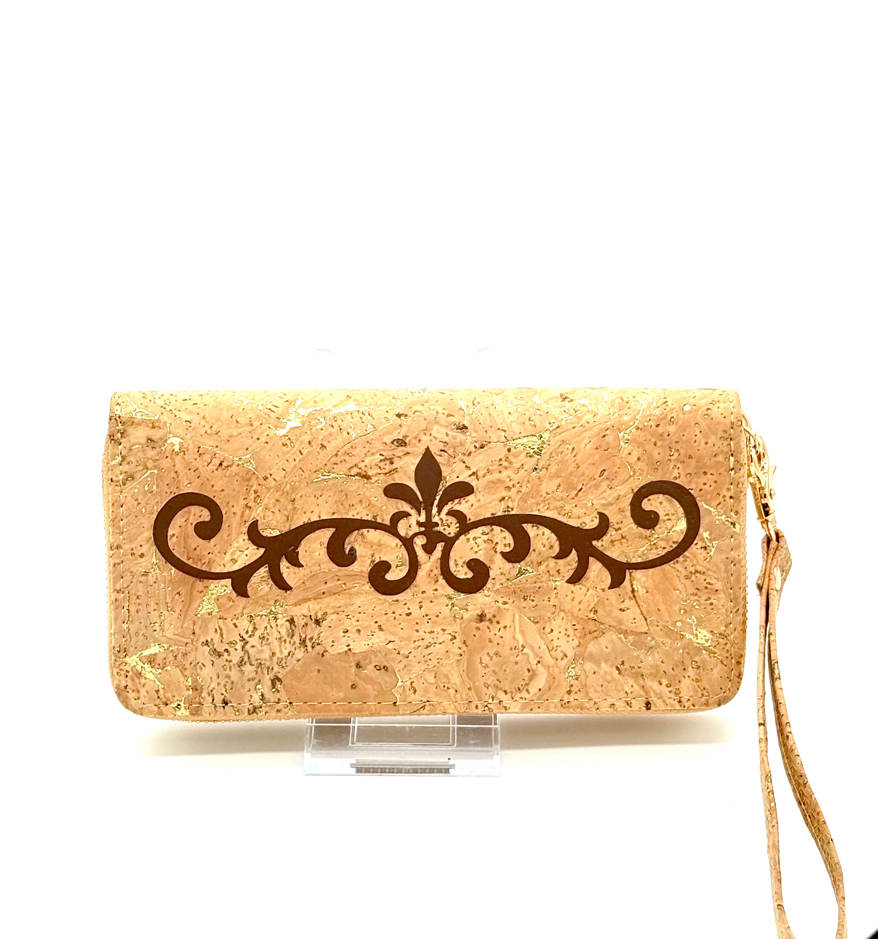 Cork clutch with decorative emblem on a white background