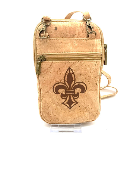 Cork crossbody bag with a fleur-de-lis design on a white background