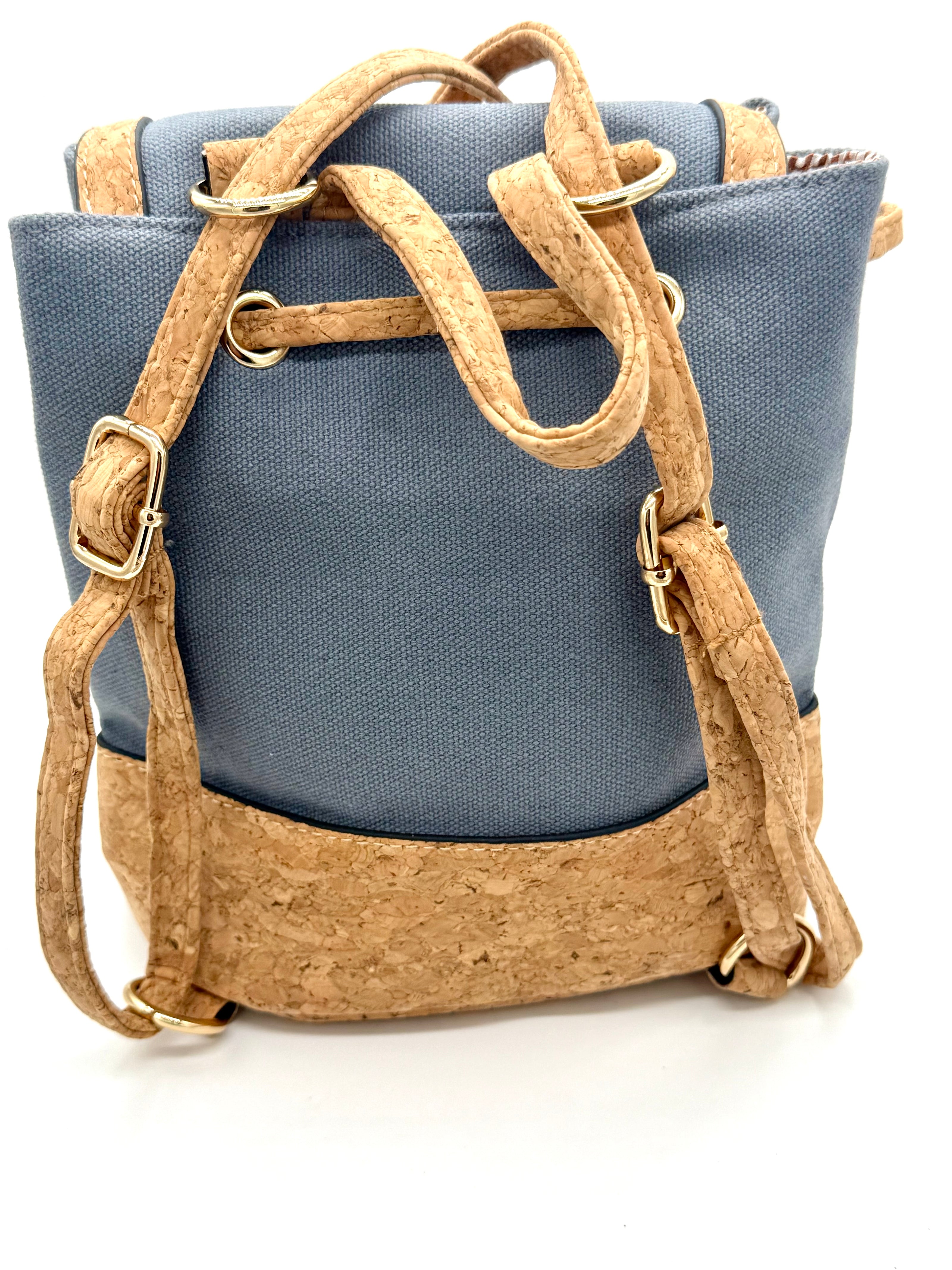 Gray backpack with cork accents on a white background