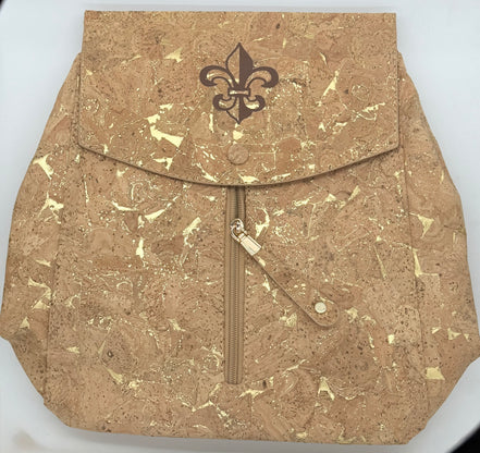 Cork backpack with a fleur-de-lis design on a white background