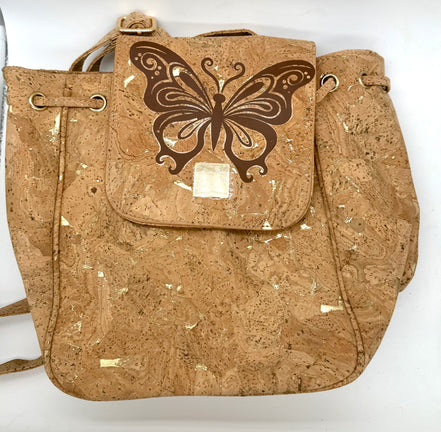 Cork handbag with a butterfly design on a white background