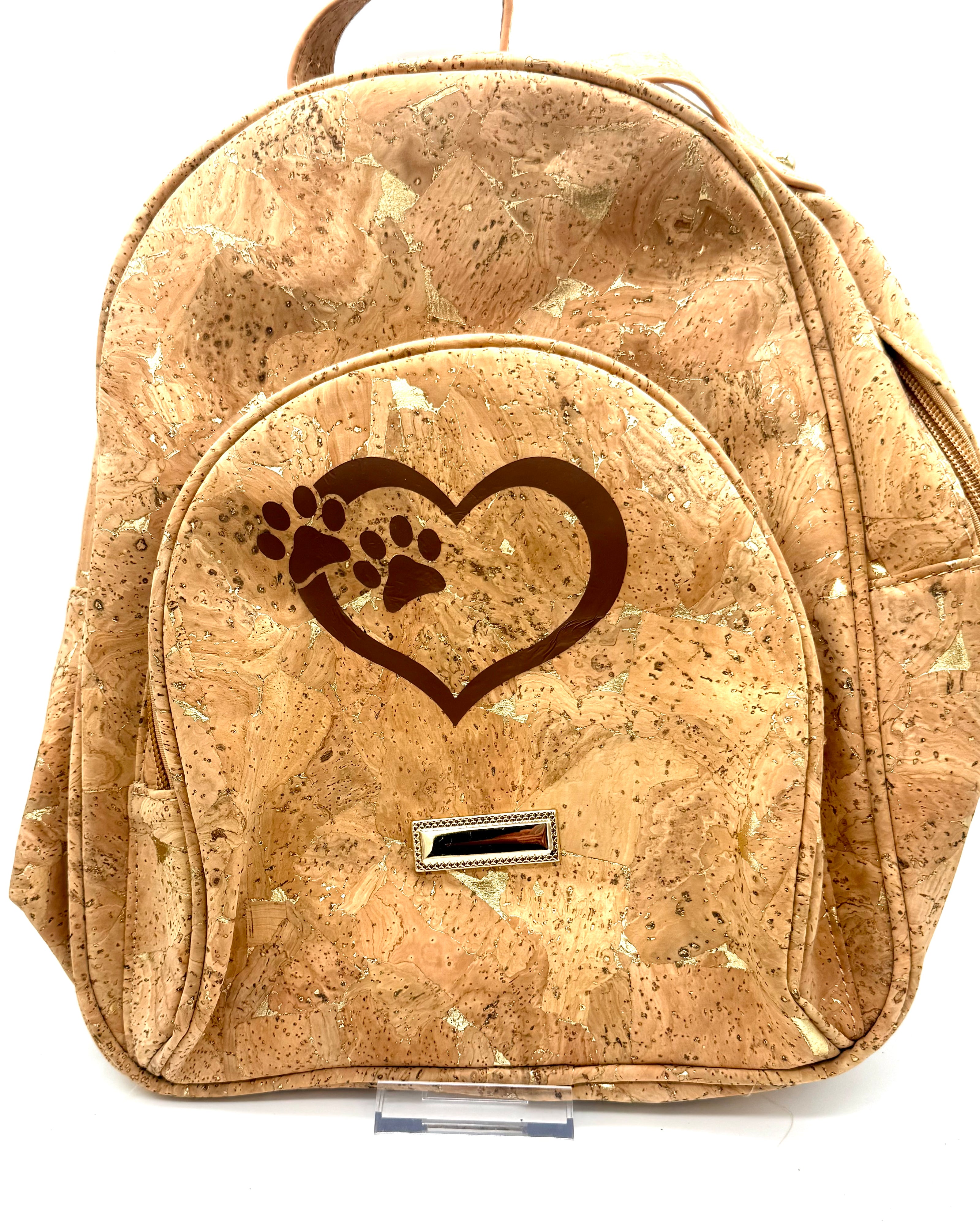 Cork backpack with a heart and paw print design on a white background