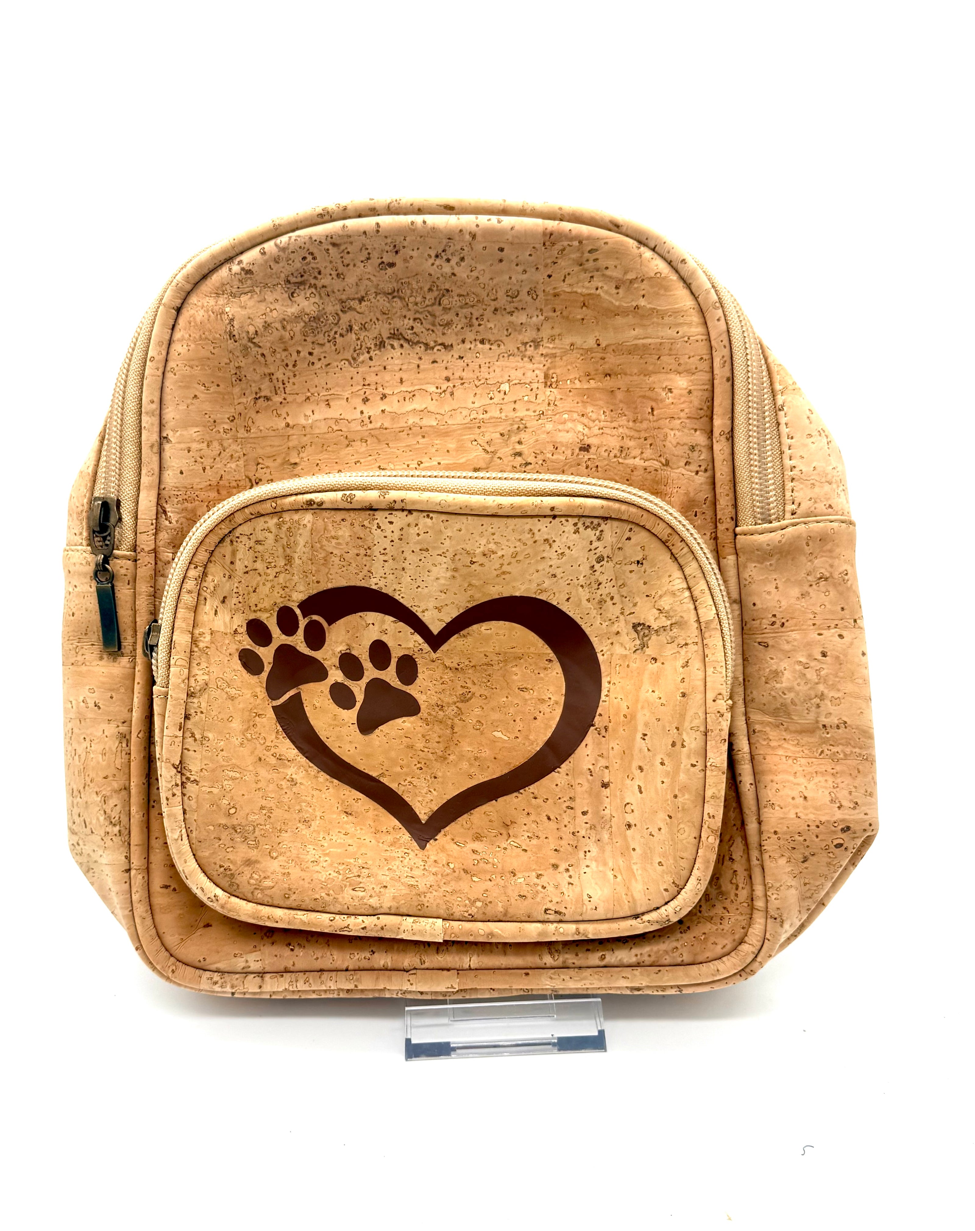 Cork backpack with a heart and paw print design on a white background