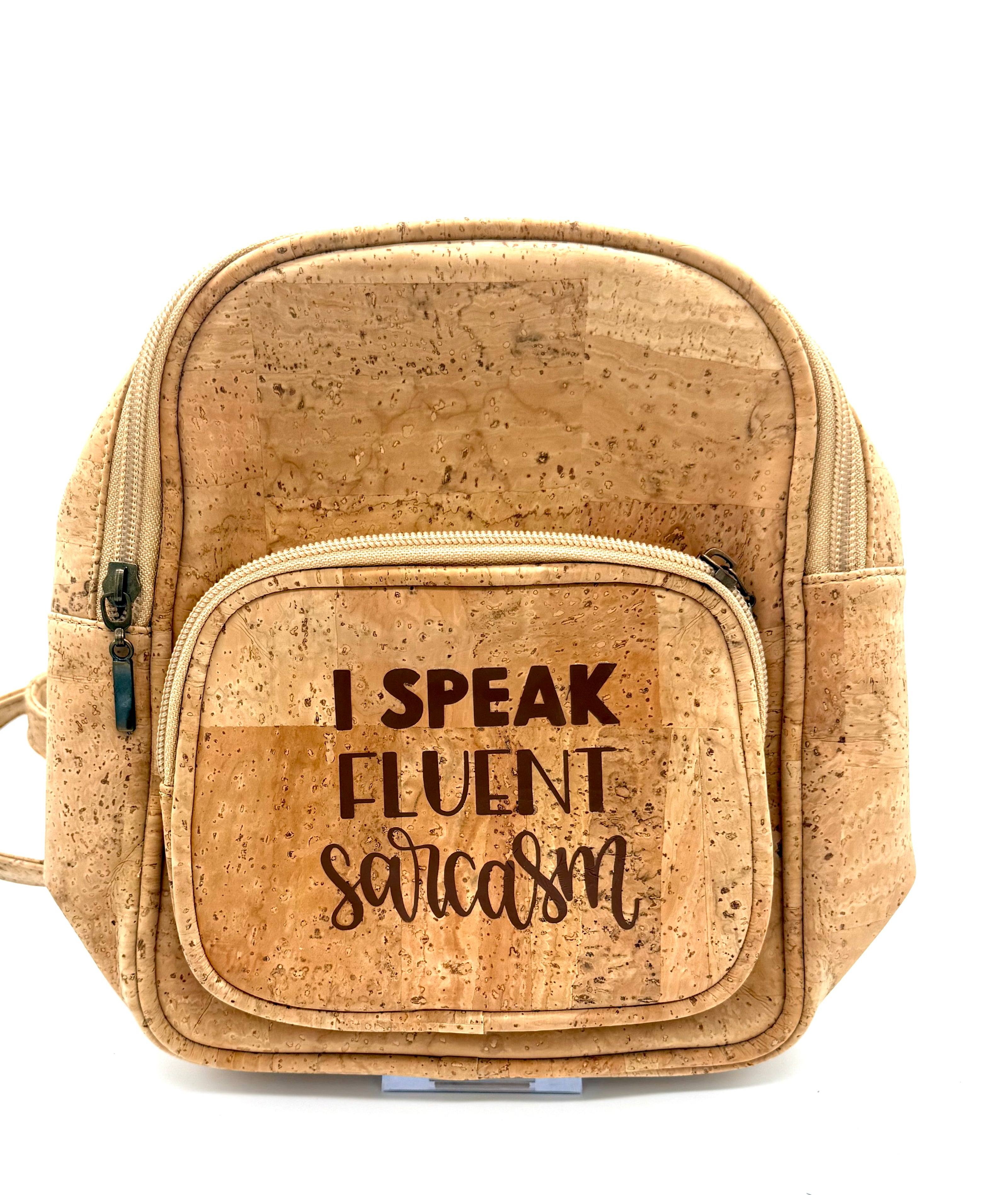 Cork bag with 'I Speak Fluent Sarcasm' text on a white background