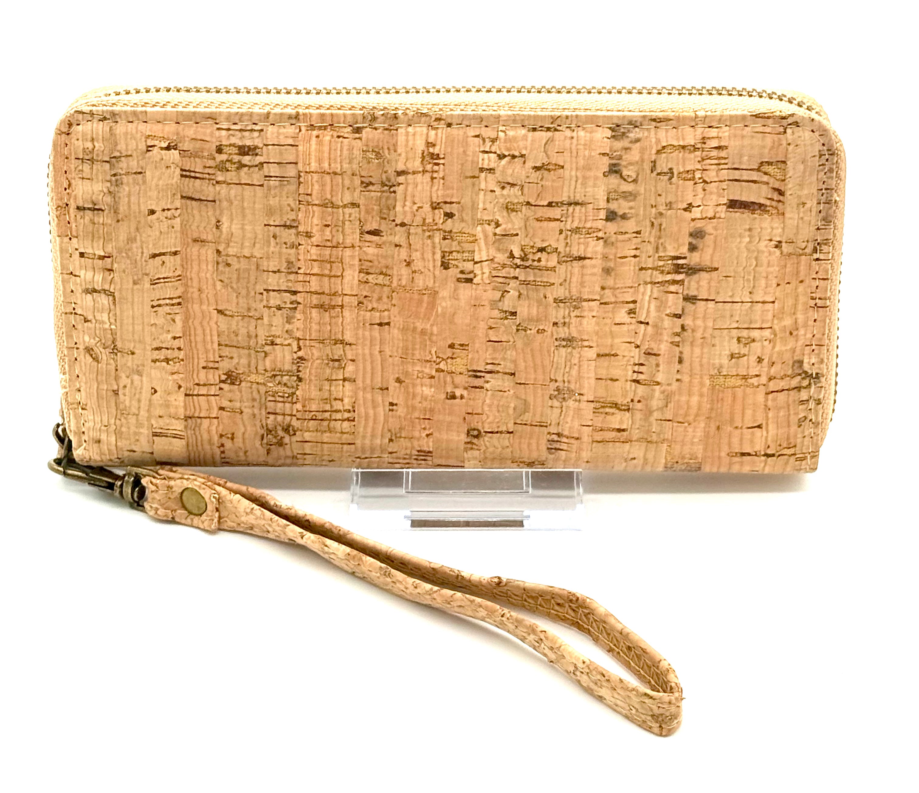 Lightweight vegan cork zipper wallet with detachable wristlet strap and organized interior.