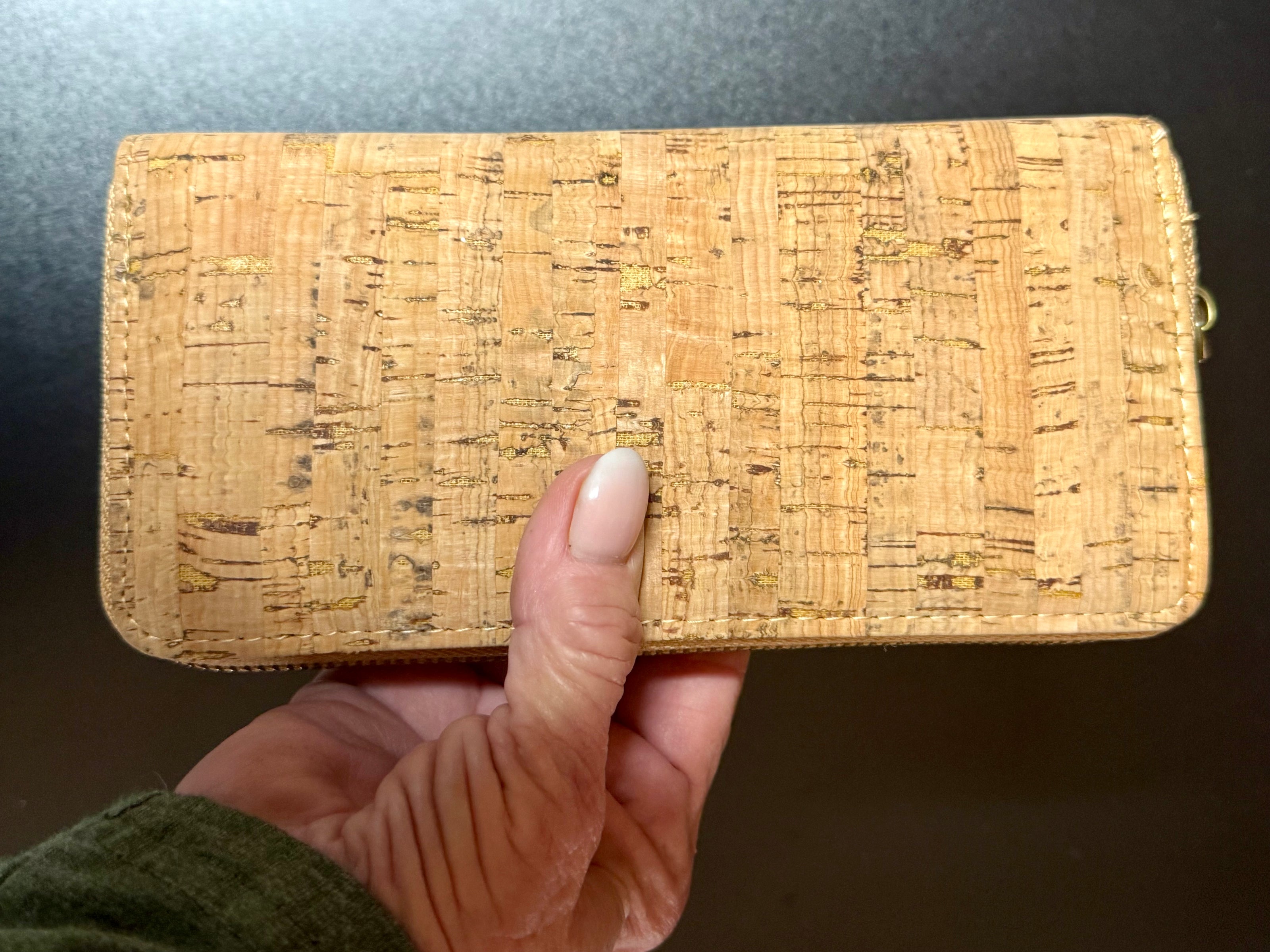 Lightweight vegan cork zipper wallet with detachable wristlet strap and organized interior.