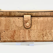 A luxurious soft cork wallet with a wristlet strap, perfect to keep your cards and cash neatly organized.