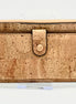 A luxurious soft cork wallet with a wristlet strap, perfect to keep your cards and cash neatly organized.