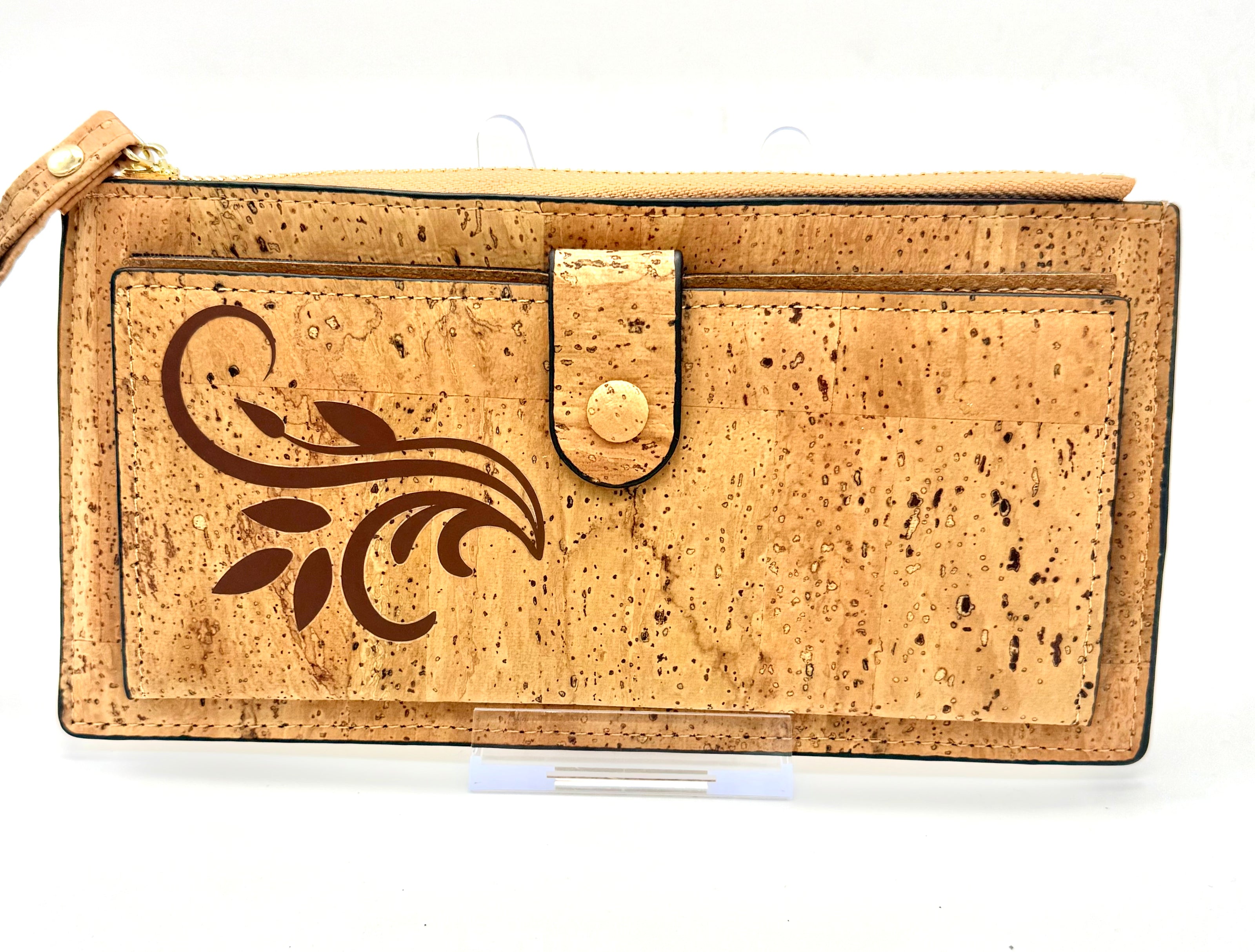 A luxurious soft cork wallet with a wristlet strap, perfect to keep your cards and cash neatly organized.