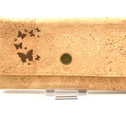 Cork wallet with butterfly designs on a white background