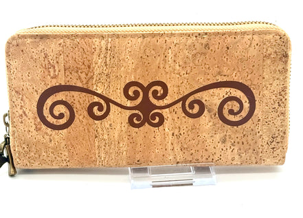 Cork wallet with decorative swirl design on a white background