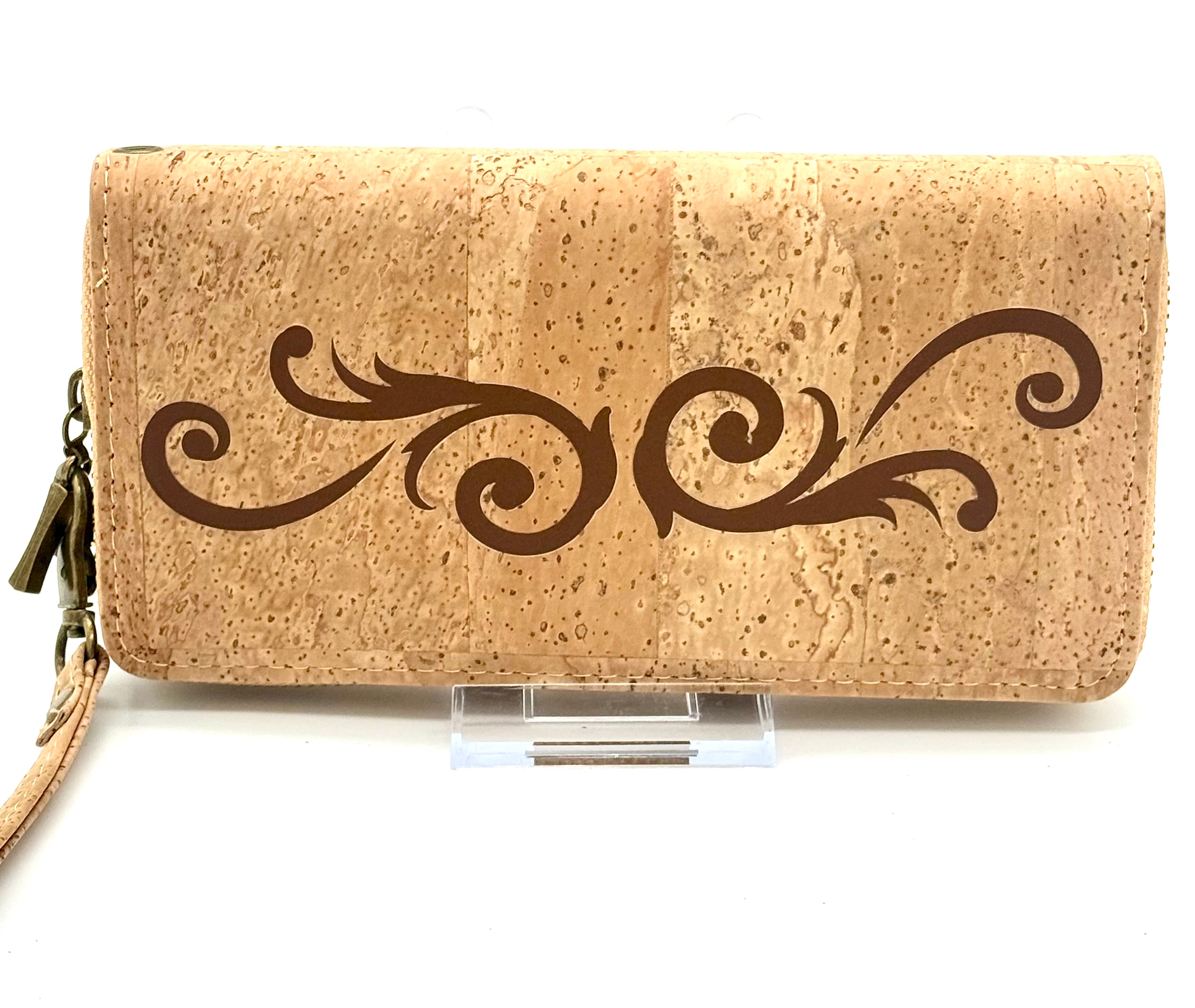 Cork wallet with decorative swirls on a white background