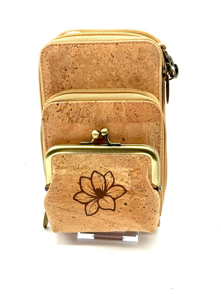 Keep your essentials organized in sustainable style with this compact, eco-friendly Cork Phone Bag and wallet. 