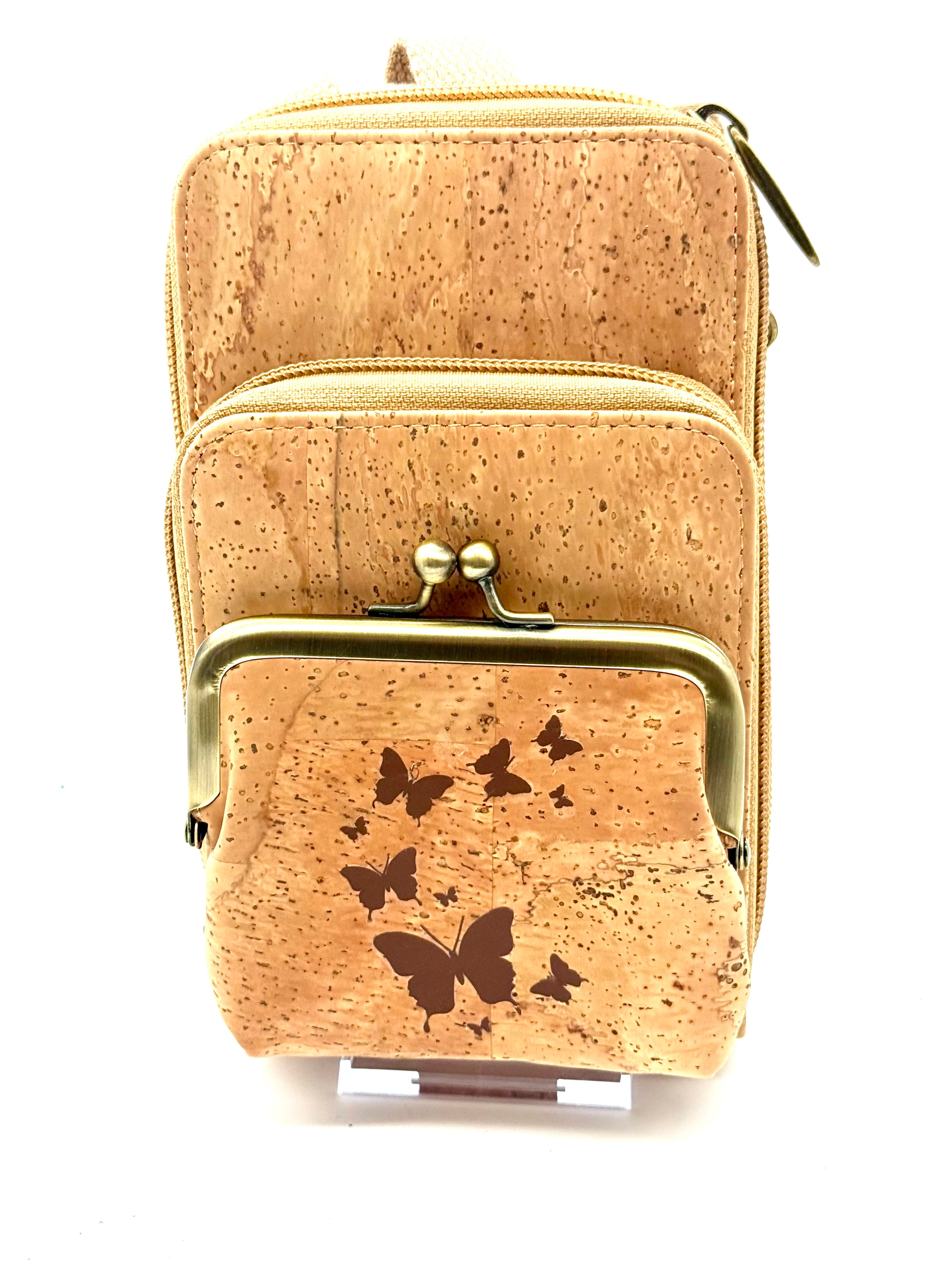 Keep your essentials organized in sustainable style with this compact, eco-friendly Cork Phone Bag and wallet. 