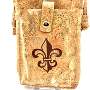 Cork pouch with a fleur-de-lis design on a white background