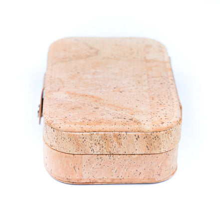 Side view of cork jewelry travel case showing compact shape