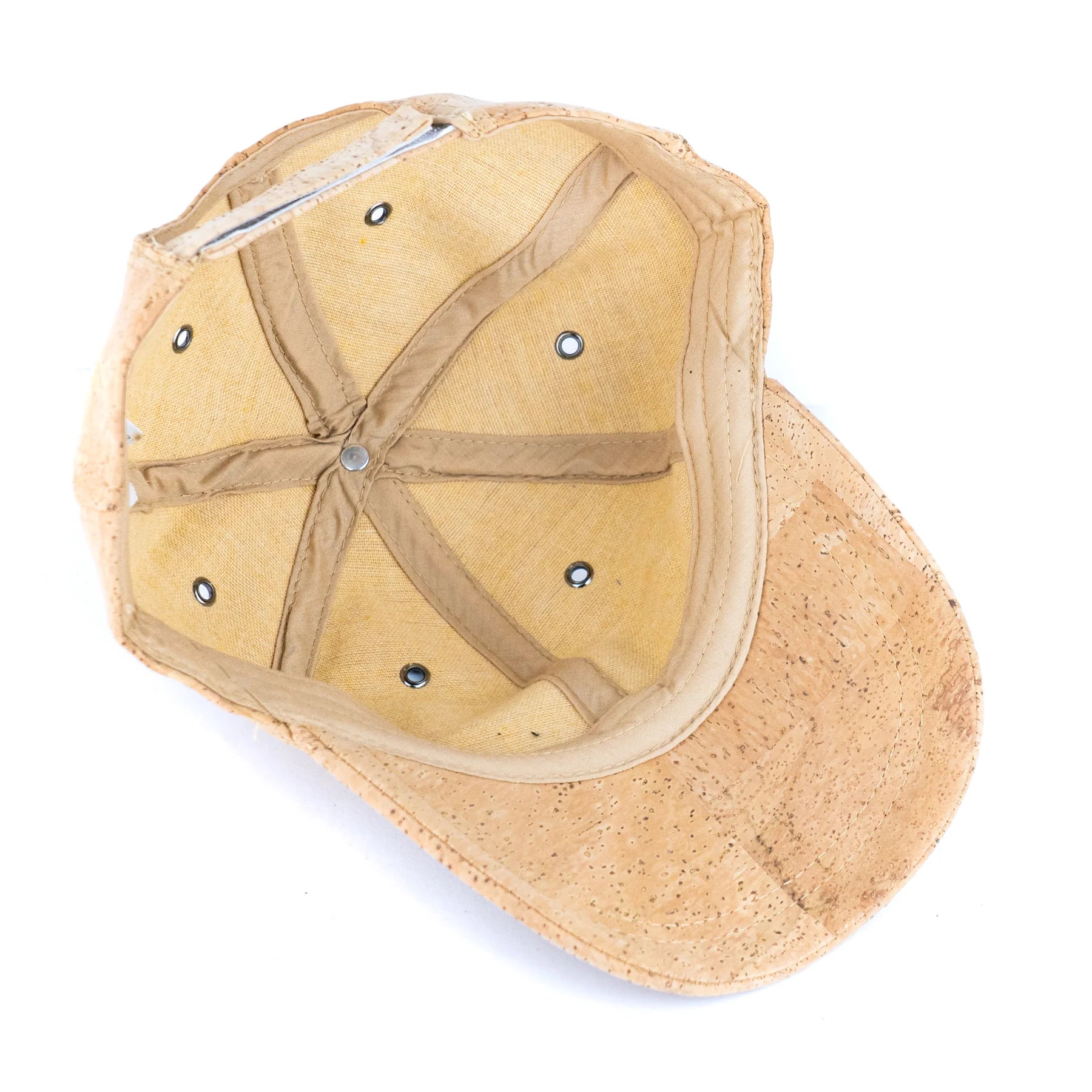 Interior of cork baseball cap showing breathable lining and stitching