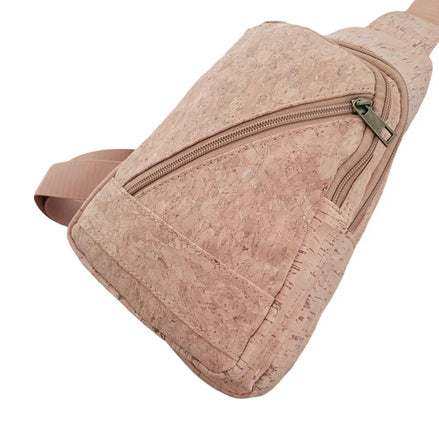 Close-up of front zipper pocket on natural cork sling bag