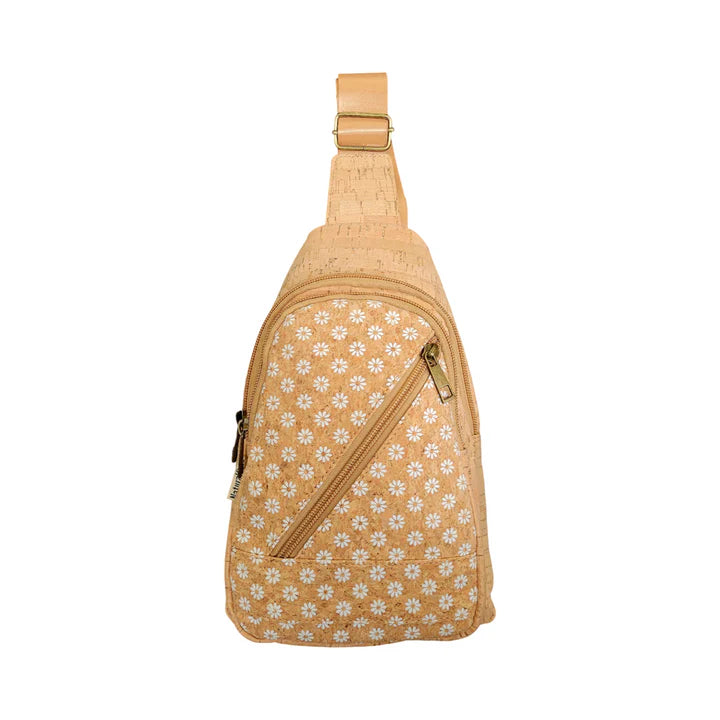 Natural cork sling bag with white daisy print and diagonal zip pocket, front view on white background