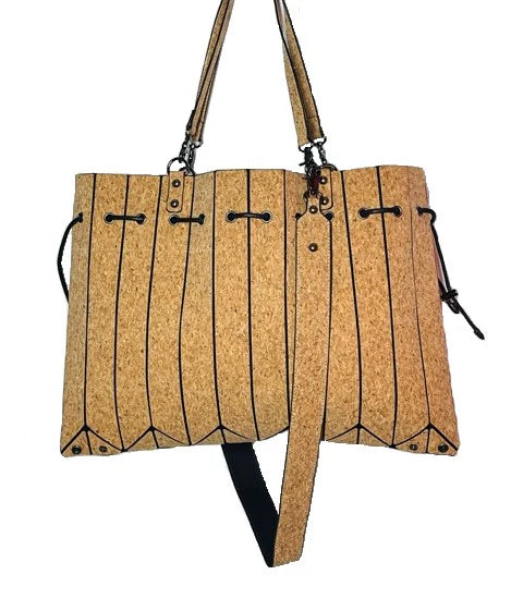 Cork tote handbag angled view showing pleated design and top handles