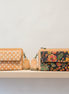 Boutique display with daisy and floral cork crossbody bags