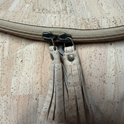 Cork purse zipper detail with improved lighting