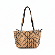 Stylish geometric design tote or shoulder bag with natural cork texture and large interior compartment for wallet, tablet, notebooks & more.
