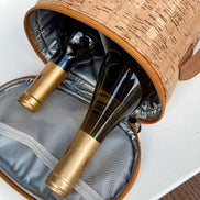 Eco friendly cork wine tote standing upright with strap